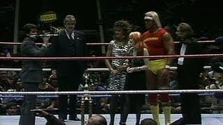 Dick Clark presents Cyndi Lauper with an award in Madison Square Garden