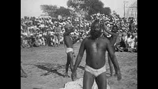A Sword Dance Performed before the King and Queen in India (1912)